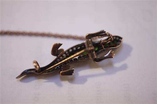 A late Victorian gold and silver, demantoid garnet and rose cut diamond set lizard brooch, 40mm.